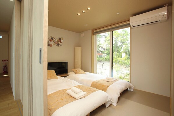 2 عدّة غرف نوم وواي فاي مجانًا وملاءات أسرّة