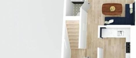 A 1-bedroom apartment layout with a living room, kitchen, and a small dining area.