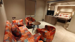 Suite Prestige | Aire de séjour | Téléviseur