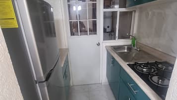 Microwave, cookware/dishes/utensils, spices, lobster pot