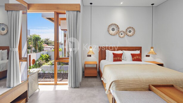 A modern bedroom with a large bed, bedside tables, a wooden headboard, and a view of the outdoors. - deTasia Villa by Kozystay - Jimbaran (Jimbaran)