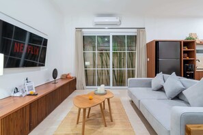 Vil·la bàsica | Sala d'estar | Televisor i serveis de streaming 