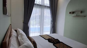 Villa panorámica, 2 habitaciones, alberca privada | Escritorio, espacio para trabajar con laptop y wifi gratis