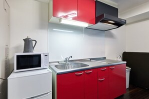 Fridge, microwave, cookware/dishes/utensils