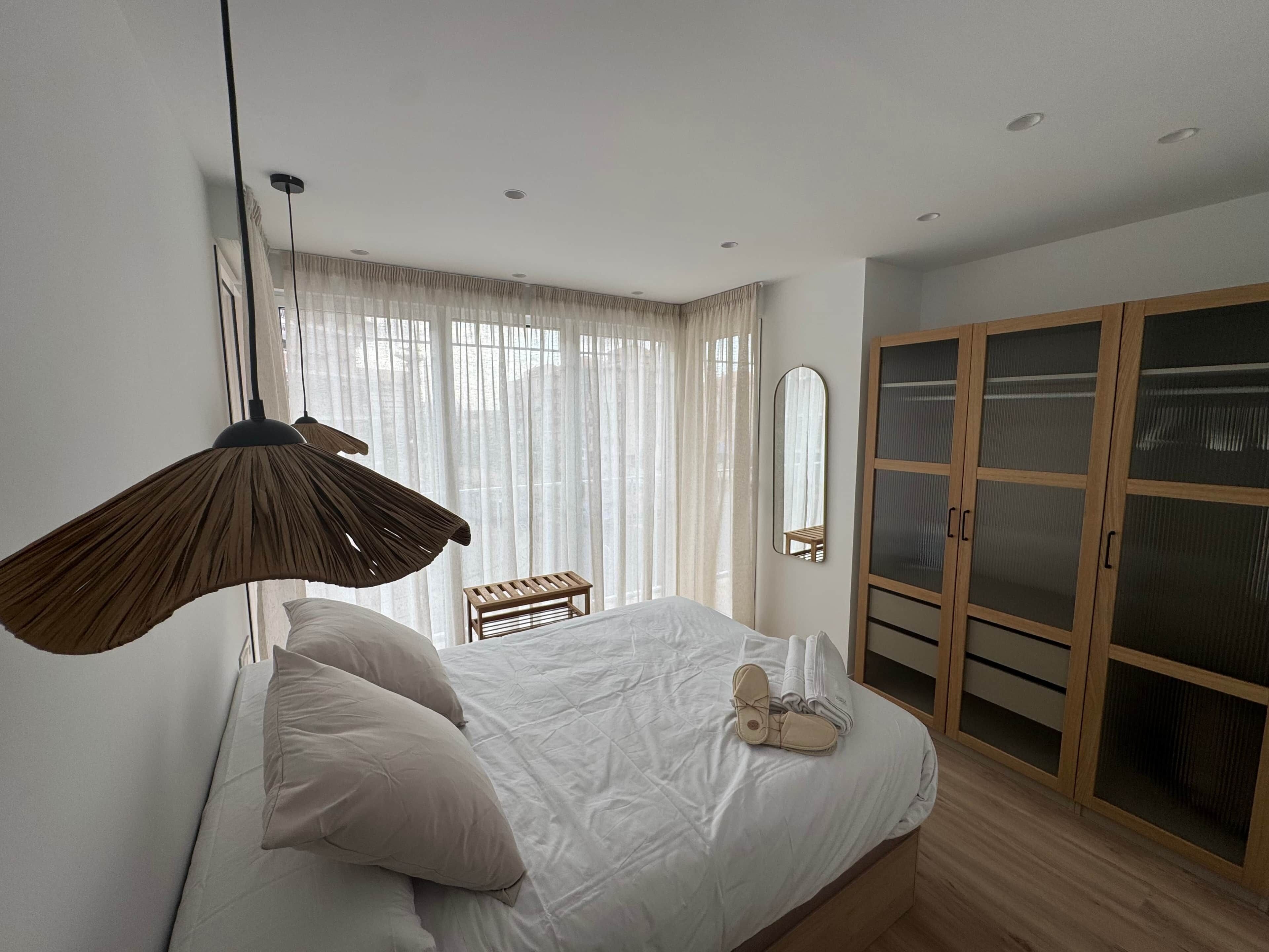 2 dormitorios, tabla de planchar con plancha, wifi gratis y ropa de cama