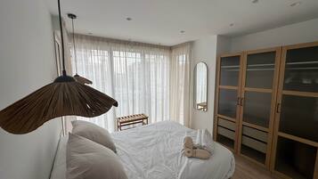 2 dormitorios, tabla de planchar con plancha, wifi gratis y ropa de cama