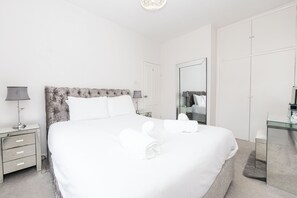 2 dormitorios, tabla de planchar con plancha, wifi gratis y ropa de cama
