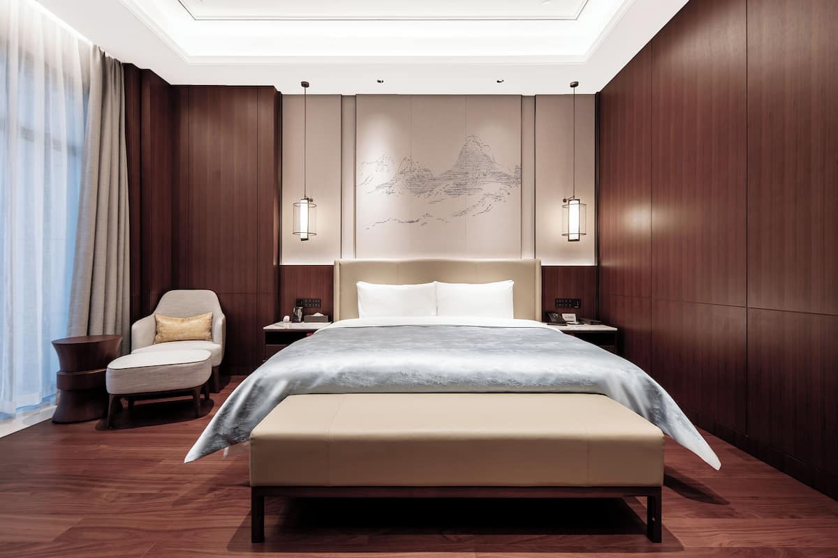 Luxury Suite, Courtyard View | Desk, laptop workspace, blackout curtains, soundproofing