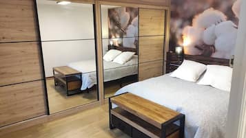 3 dormitorios, tabla de planchar con plancha, wifi gratis y ropa de cama
