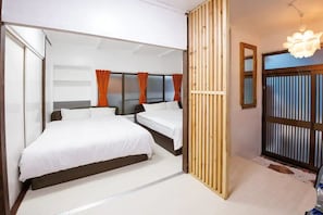 Apartamento família | Ferros/tábuas de passar roupa, Wi-Fi de cortesia, roupa de cama