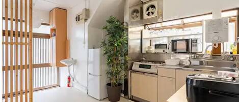 Family Apartment | Private kitchen | Full-size fridge, microwave, stovetop, toaster
