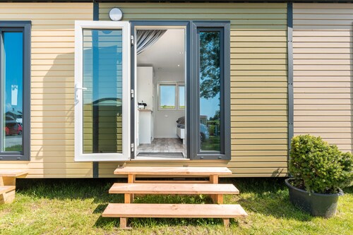 Tiny Home 'Surfbrett 2' mit Gemeinschaftsgarten und WLAN