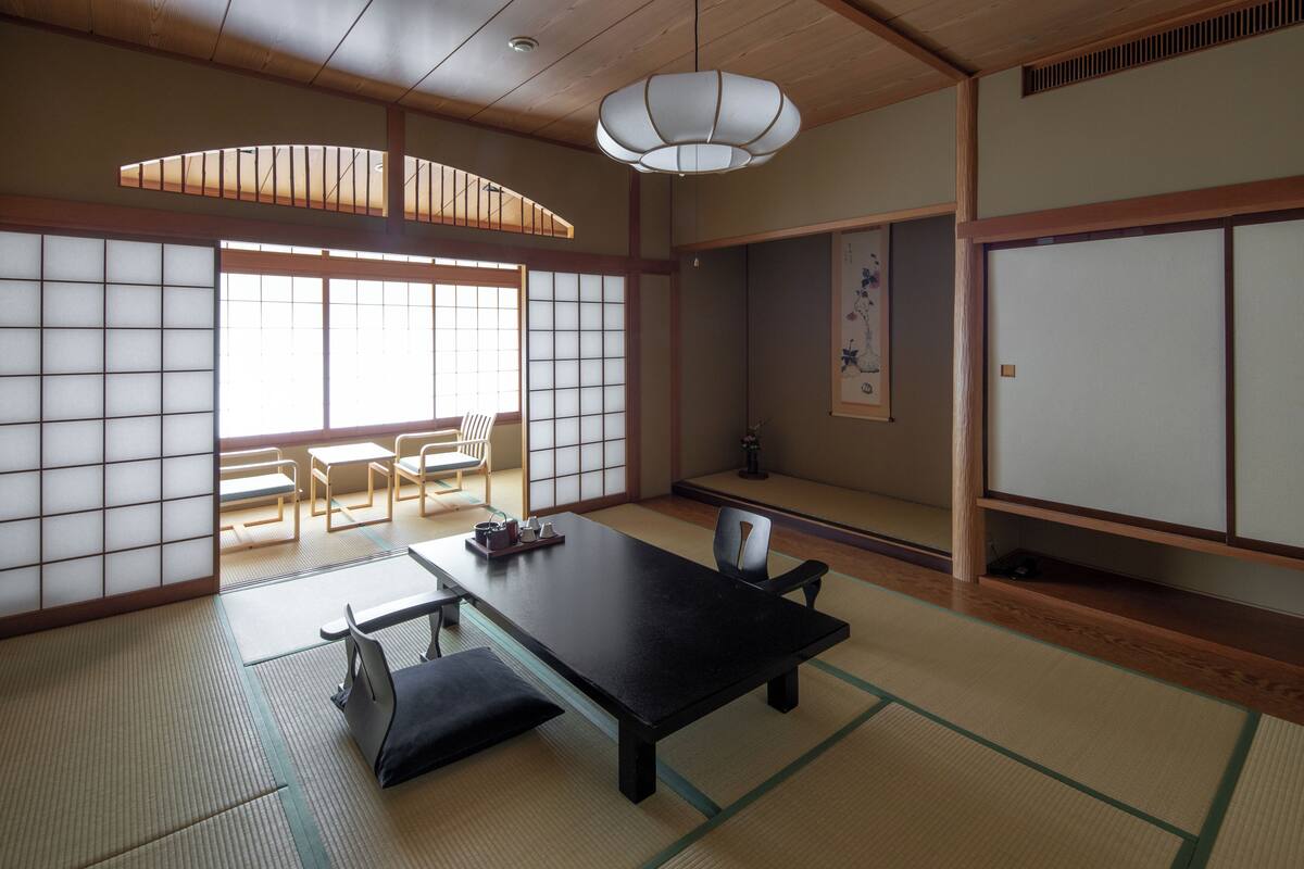 Quadruple Room, Shared Bathroom | In-room safe, blackout drapes