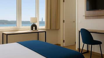 Comfort Double or Twin Room, Partial Sea View | In-room safe, desk, laptop workspace, blackout curtains