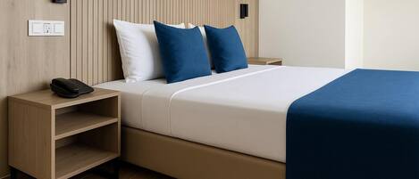 Classic Double Room, City View | In-room safe, desk, laptop workspace, blackout drapes