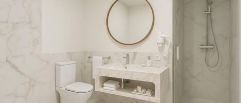A modern bathroom with a toilet, sink, mirror, and shower.