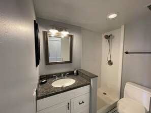 Shower, towels, toilet paper