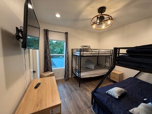 3 bedrooms, desk, iron/ironing board, travel crib