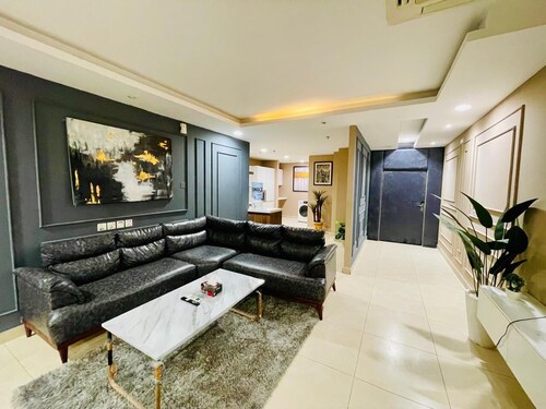 Charming One Bed Room Apartment with AC in Lively DHA Lahore