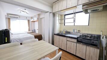 Fridge, microwave, cookware/dishes/utensils