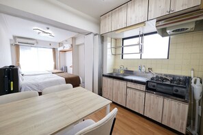 Fridge, microwave, cookware/dishes/utensils