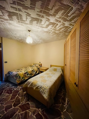 2 chambres, fer et planche Ă repasser, draps fournis