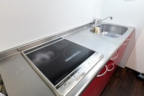 Fridge, microwave, cookware/dishes/utensils