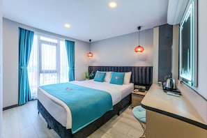 Standard Double Room, City View | In-room safe, desk, laptop workspace, blackout drapes