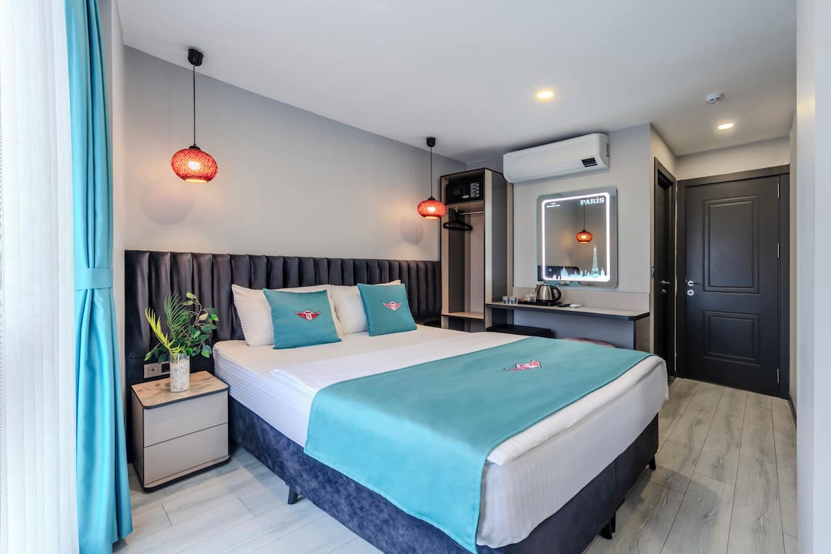 Standard Double Room, City View | In-room safe, desk, laptop workspace, blackout drapes