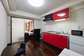 Fridge, microwave, cookware/dishes/utensils