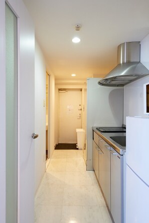 Fridge, microwave, cookware/dishes/utensils