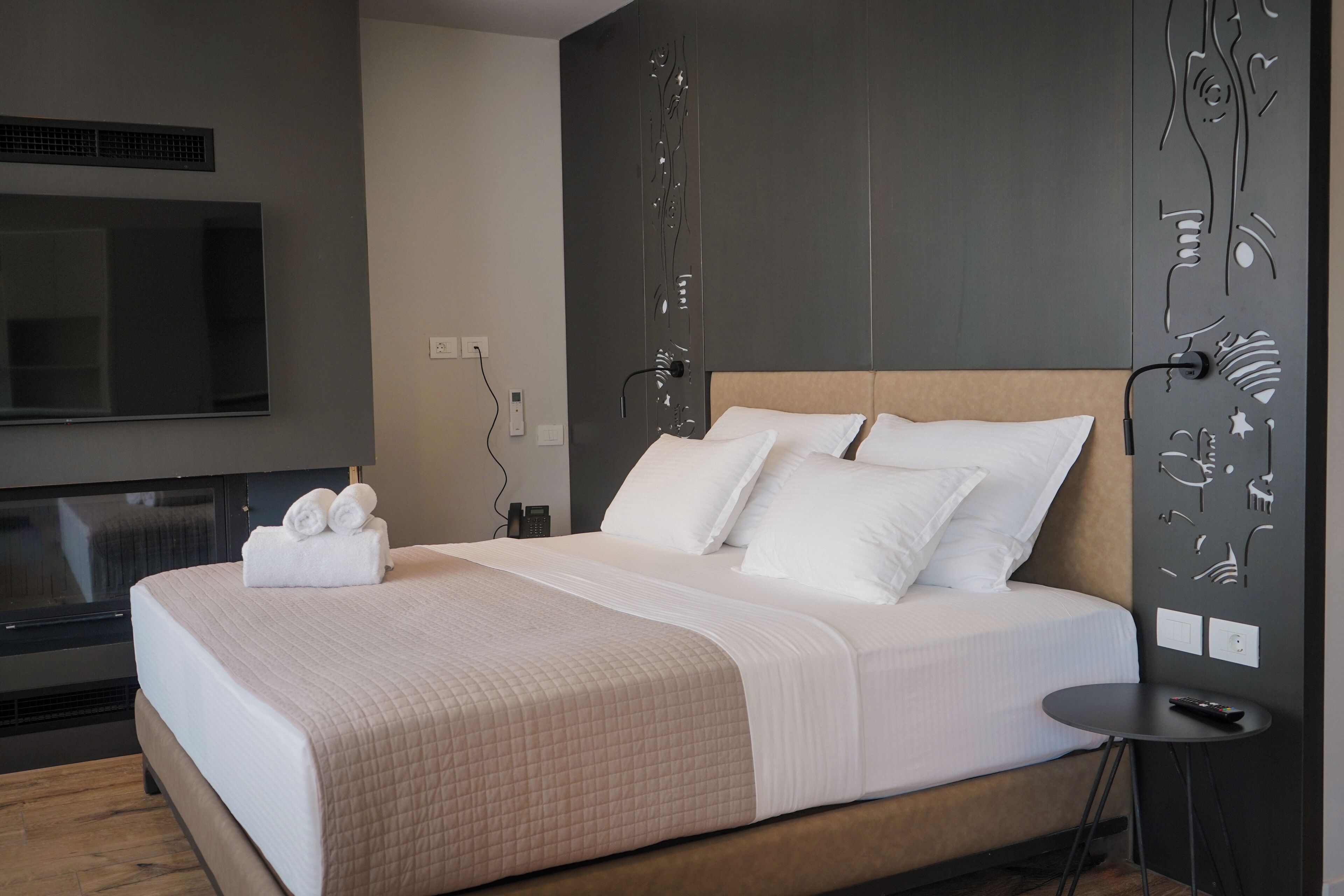Suite junior, vista a la ciudad | Sábanas italianas Frette y ropa de cama de alta calidad 