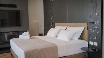 Suite junior, vista a la ciudad | Sábanas italianas Frette y ropa de cama de alta calidad
