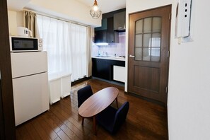 Fridge, microwave, cookware/dishes/utensils