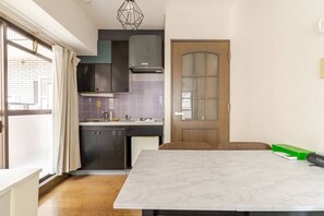 Fridge, microwave, cookware/dishes/utensils