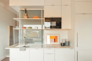 Fridge, microwave, dishwasher, coffee/tea maker