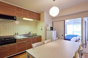 Fridge, microwave, cookware/dishes/utensils