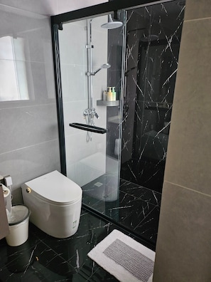 Apartment, 3 Bedrooms, Accessible, Balcony | Bathroom - Heinemann's Vaca Apartment at Mount Emei Hosted by a German Couple (Leshan)