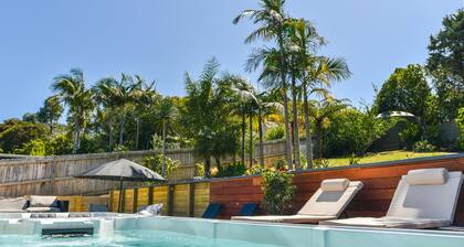 La Maison Soleil - Modern, sun-filled home with 4 bedrooms (2 kings including a stand-alone sleepout in the pool area, 2 queens) and 3 tiled bathrooms. Features a full kitchen, aircon, and open living flowing to a large garden with BBQ, heated swim s