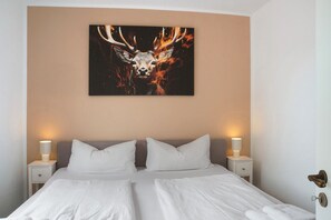 2 habitaciones, tabla de planchar con plancha, wifi y ropa de cama
