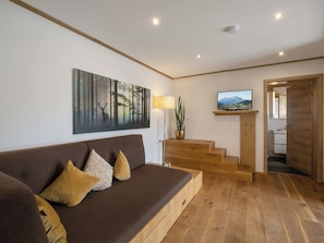 Comfort Apartment, 2 Bedrooms, Balcony | Living area | 50-inch flat-screen TV with cable channels