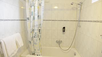 Basic Double Room | Bathroom | Rainfall showerhead, hair dryer, towels, soap