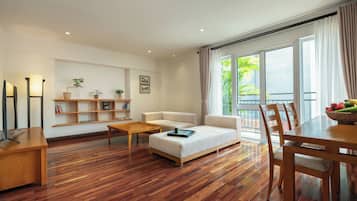 Superior Apartment, City View | Minibar, in-room safe, desk, iron/ironing board