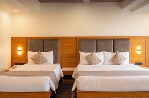 Memory foam-madrasser, minibar och värdeförvaringsskåp på rummet