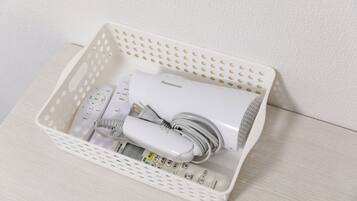 Hair dryer, towels, soap, toilet paper