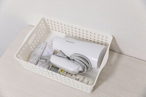 Hair dryer, towels, soap, toilet paper