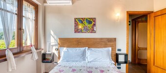 Room 'Esimio' with Shared Garden, Wi-Fi and Air Conditioning