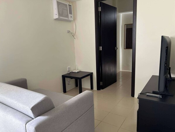 คอนโด, 1 ห้องนอน, พร้อมสิ่งอำนวยความสะดวกสำหรับผู้พิการ, วิวเมือง | ห้องนั่งเล่น