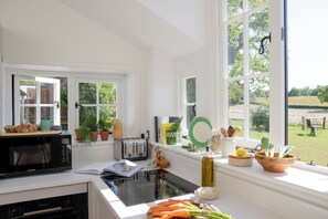 Cottage, Patio, Garden View | Private kitchen | Highchair