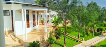 Chill in Style — Your Perfect Stay at Hellens Riverside Villas-KIBO WING Awaits!